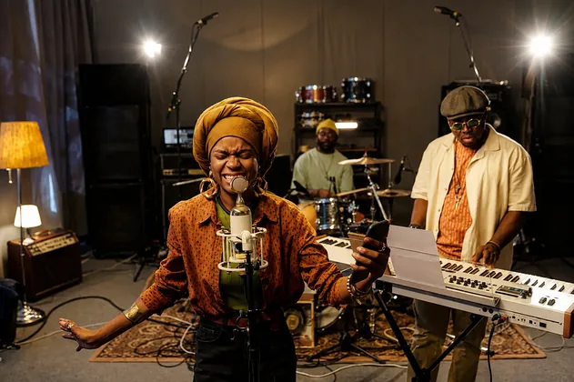 African artists collaborating in a studio session